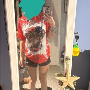 American flag highland cow, size medium, not sure what brand